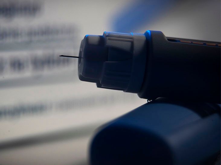 Close up GLP-1 injectable pen and packaging