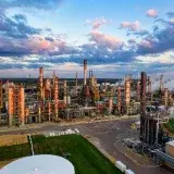 Stunning aerial shot of an oil refinery in Rosemount, MN, showcasing industrial complexity at sunset.