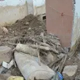 Interior of a building in Mocoa, Colombia, showing debris after a natural disaster.