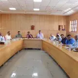 A group of men are having a meeting.