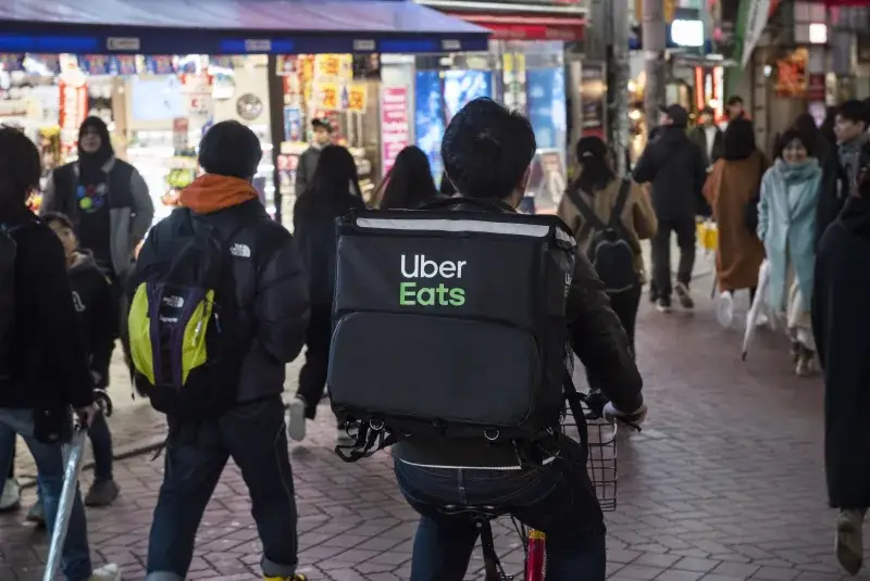 Uber compra Delivery Hero por 14.8 millardos de dólares