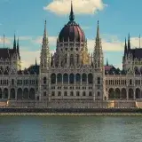 Majestic view of the Hungarian Parliament Building in Budapest along the Danube River.