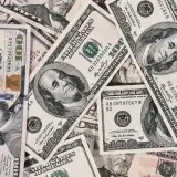 Detailed close-up of US dollar bills highlighting wealth and finance concepts.