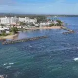 Stunning aerial view of Dorado's beachfront and resorts in Puerto Rico on a sunny day.