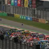 Dynamic truck race at Mexico City's famous Autódromo Hermanos Rodríguez track.