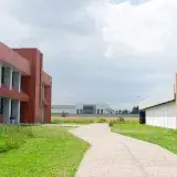 Image of modern buildings with green surroundings in Lerma de Villada, Mexico. Ideal for architectural themes.