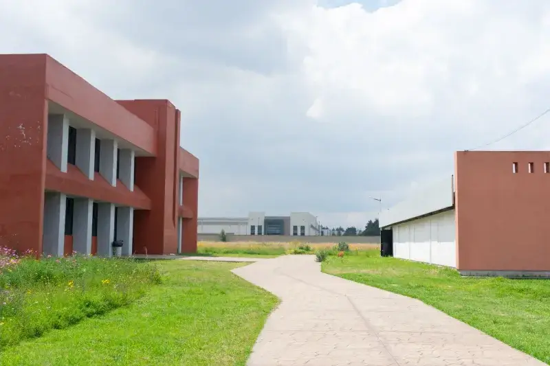 Image of modern buildings with green surroundings in Lerma de Villada, Mexico. Ideal for architectural themes.