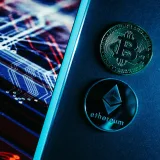 Bitcoin and Ethereum coins on a digital circuitry background symbolizing blockchain technology.