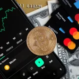 A visual representation of Bitcoin trading and financial transactions with credit cards and cash.