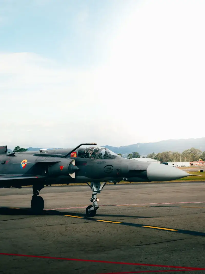 A military jet aircraft on a runway in Rionegro, Antioquia, Colombia on a sunny day.