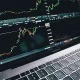 Close-up of a financial graph on a laptop screen, depicting stock market analysis in Berlin.