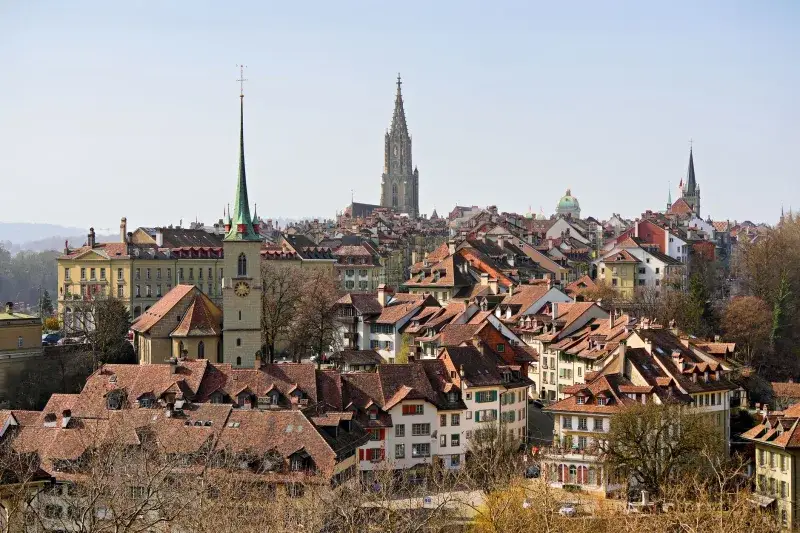 A captivating view of Bern, Switzerland, featuring iconic medieval architecture and the Bern Cathedral.