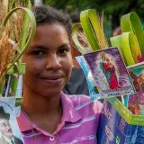 File:Girl selling Palm Sunday palms and devotional cards in Maracaibo, Venezuela.jpg