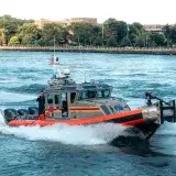 A FDNY fireboat navigates the waters of New York City for emergency services and maritime safety.