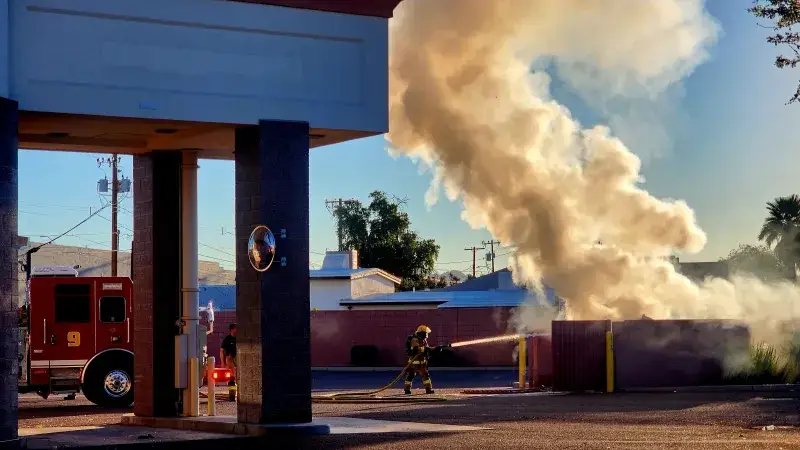 File:Firefighter dousing Dumpster Fire in Phoenix.jpg