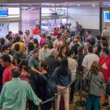 File:People line in Maiquetía Airport.jpg