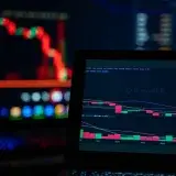 Bright trading screens depict cryptocurrency market trends in a tech setup.