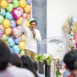 A pastor speaks passionately during a vibrant church event in Ciudad de México, Mexico.
