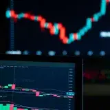 Detailed view of cryptocurrency trading charts on digital screens, showcasing market fluctuations.