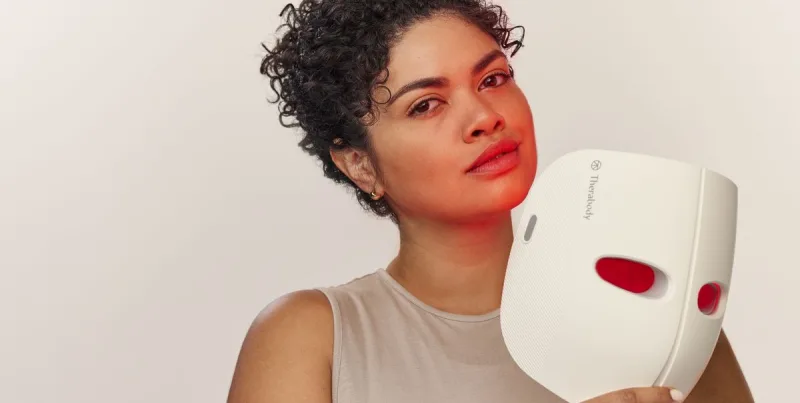 Therabody Just Launched an All-in-One LED Face Mask and Head Massage Tool