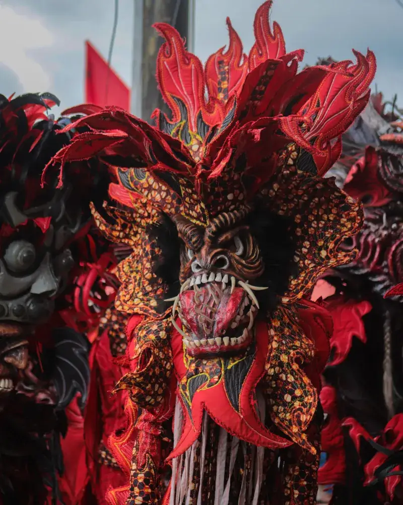 Close-up of a colorful Diablo Congo mask at the Portobelo festival, showcasing cultural vibrancy.