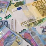 Image of various Euro banknotes spread out, captured in Berlin.
