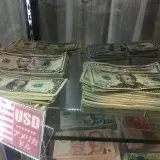 File:American dollar in stacks Tokyo area - Jan 2020.jpeg