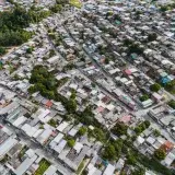 Aerial view of São José Operário, Brazil showing dense residential area with greenery.
