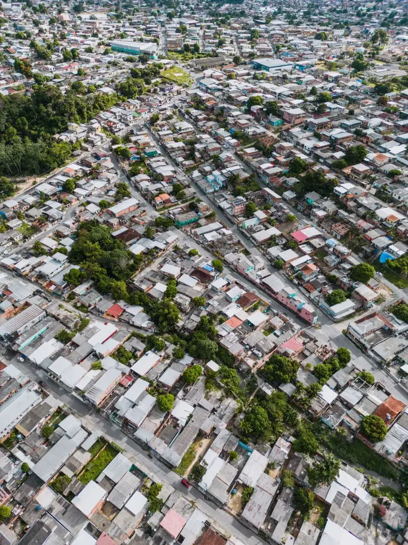 Aerial view of São José Operário, Brazil showing dense residential area with greenery.