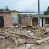 Rural village houses damaged by flood debris in Mocoa, Colombia.