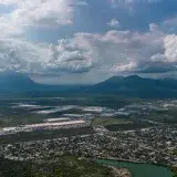 Scenic aerial view of Salinas Victoria, Nuevo León with mountains and clouds.