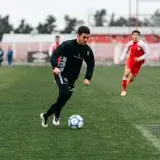 Dynamic capture of a soccer player dribbling during a competitive match.