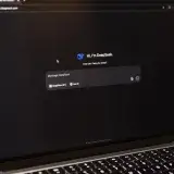 Image of a laptop showing an interactive AI interface with DeepSeek application.