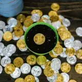 A creative still life of bitcoin coins in a pot, symbolizing growth and investment.