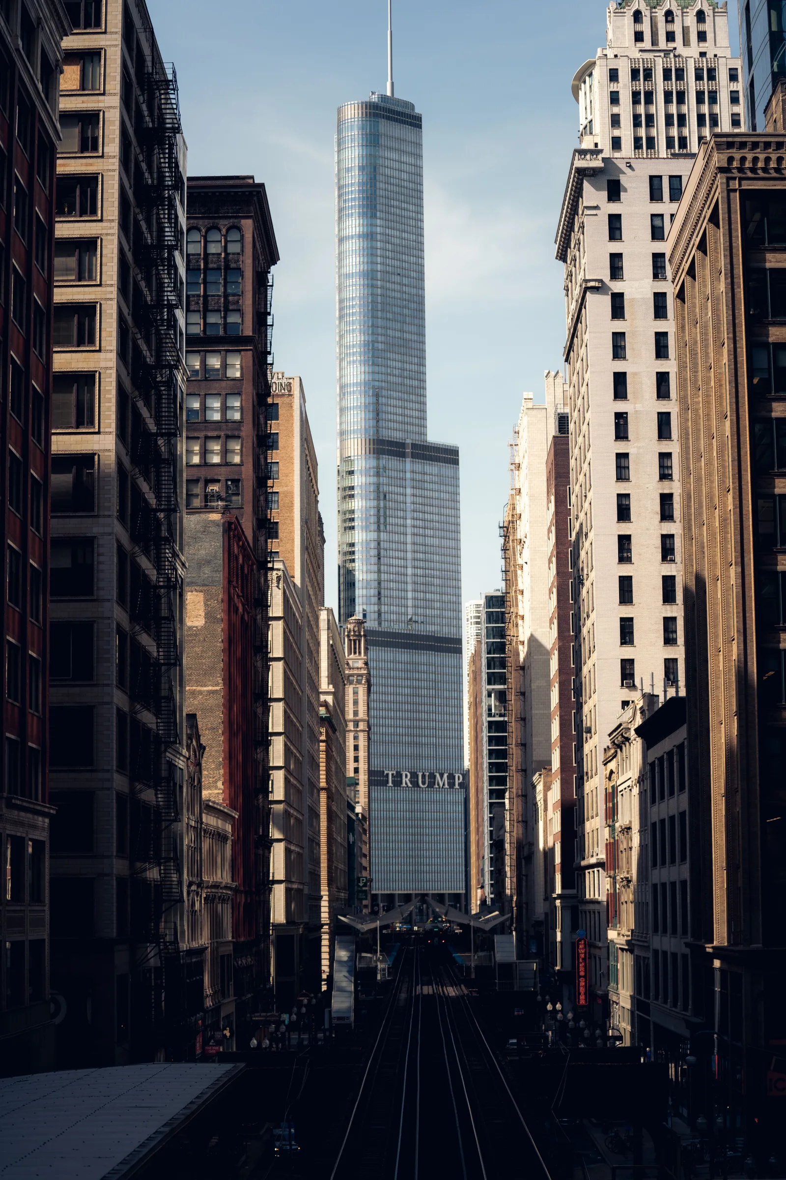Dramatic view of Trump Tower amidst the Chicago Loop's skyscrapers.