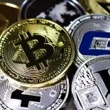 Close-up view of assorted cryptocurrency coins featuring Bitcoin, Litecoin, and others, symbolizing digital finance.