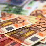 Stack of 50 euro banknotes, representing wealth and finance concepts.