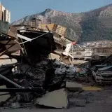 Devastating earthquake destruction in Antakya, showing collapsed buildings and debris.