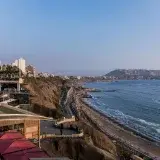 Explore the stunning coastal view of Miraflores, Lima, capturing the vibrant sea and cityscape.