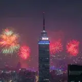 Night fireworks around Torre Latinoamericana in Mexico City's historic center.