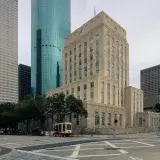 Urban view of Houston's downtown with historic and modern buildings highlighting the skyline.