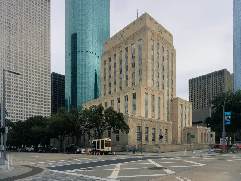 Urban view of Houston's downtown with historic and modern buildings highlighting the skyline.