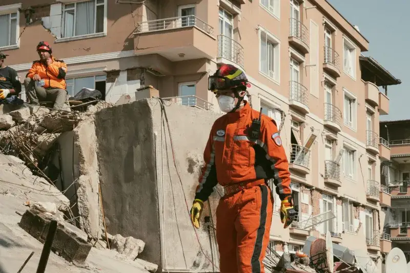 Rescue operation in Antakya, Türkiye, after a destructive earthquake, showcasing emergency response.