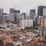 Panoramic view of Barcelona's skyline showcasing modern skyscrapers and residential buildings.