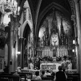 Black and white image of a mass in a Gothic cathedral in Caracas, Venezuela.