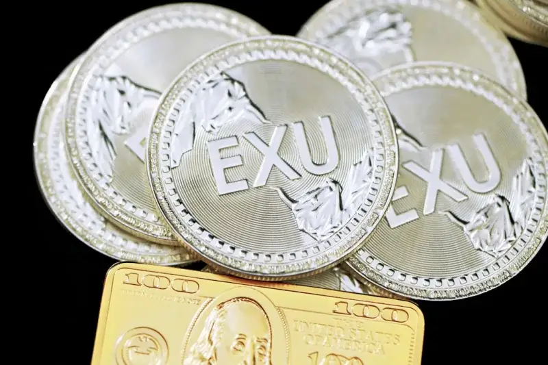 A group of Executium coins with a gold