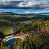 File:SJ Norge El 18 with Regiontog on Orkla bridge.jpg