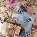 US dollars and Euros - cash banknotes