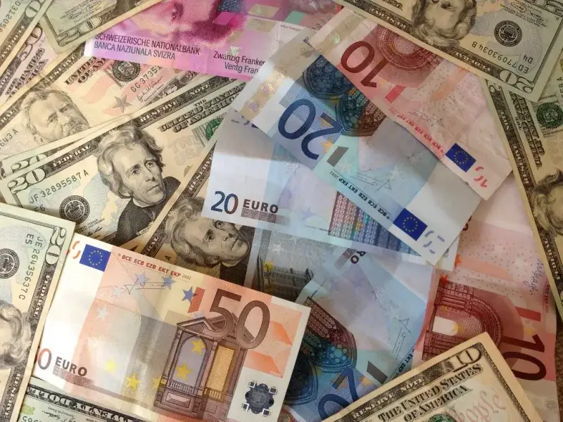 US dollars and Euros - cash banknotes