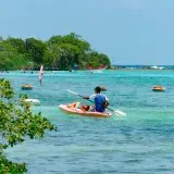 Enjoy a summer kayaking adventure in the clear waters of Ocumare de la Costa, Venezuela.